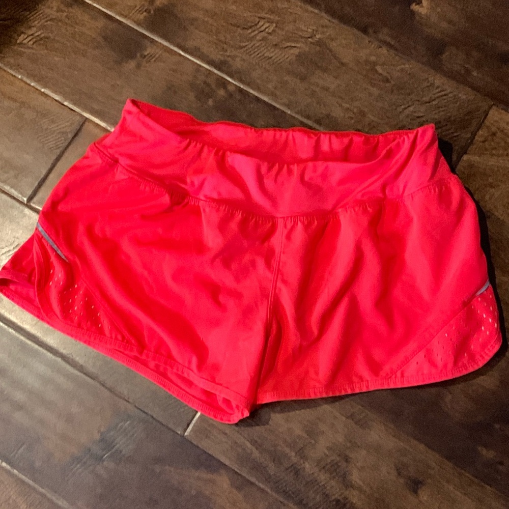 Champion running shorts with pocket and built in underwear. Size large